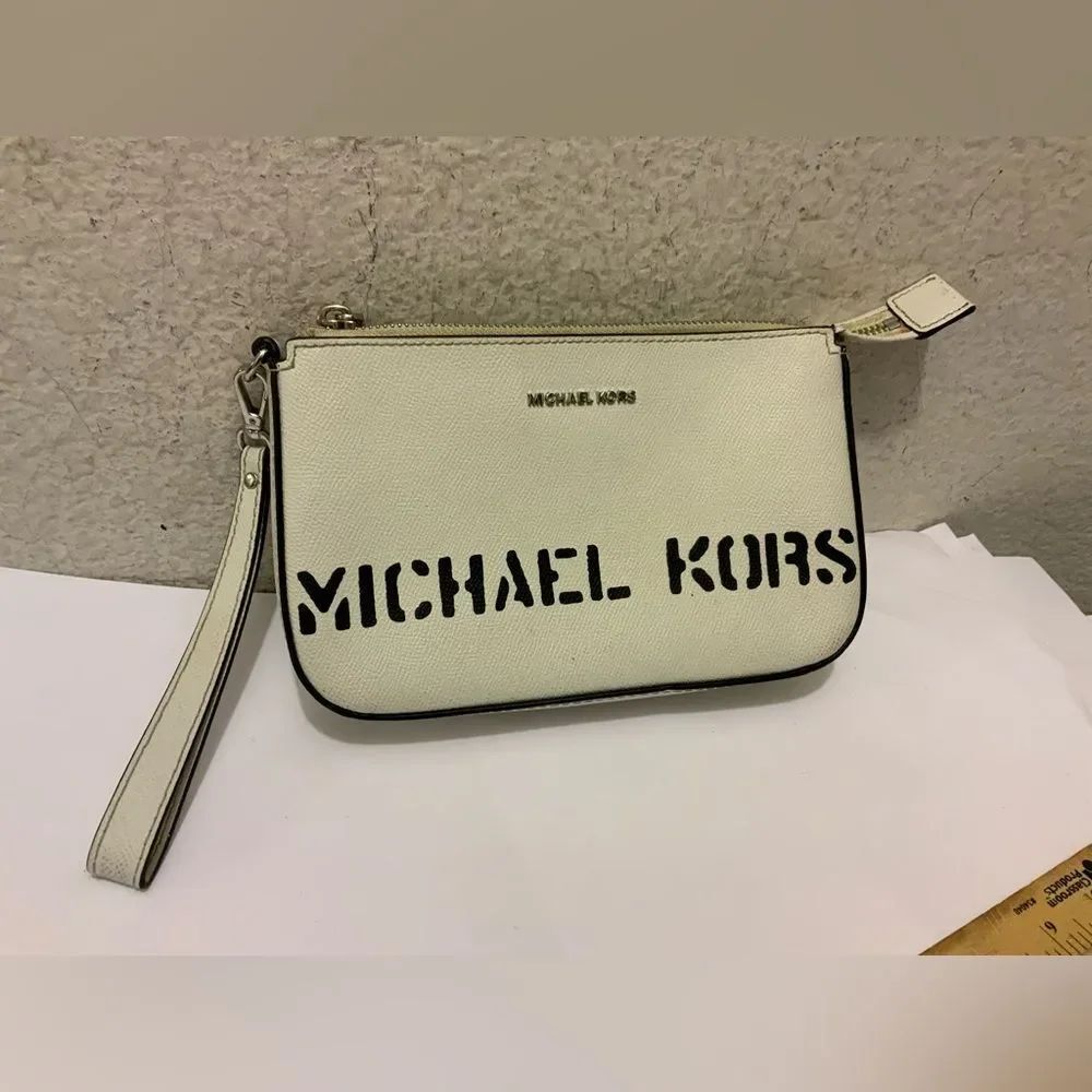 Michael KorsβSaylor Large white Pouchette Wristlet